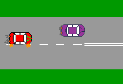 When starting to overtake you see the dividing lines ahead change to double unbroken lines. What should you do?