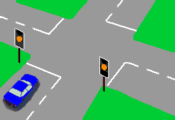 It is early morning and there is no other traffic about. You approach an intersection when the traffic lights change from green to amber. What should you do?