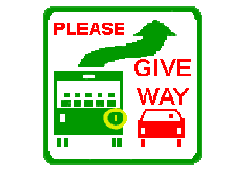 You are driving in a 60 km/h zone with only one lane for traffic in your direction. You see a bus ahead (with this sign displayed on the rear) signalling its intention to pull out from a bus stop. You should -