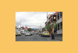 As you drive into an intersection, the lights turn to amber. You should -