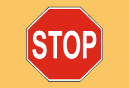 What must you do when you approach a stop sign?