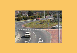 You wish to turn left at this roundabout. Which lane may you use?