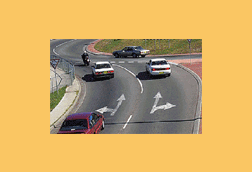 When turning left at a roundabout you should enter and leave the roundabout