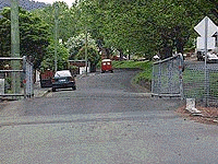This bridge has only just enough room for two vehicles. As you come close to it you should -