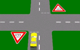 在交叉路口的让路(GIVE WAY)标志牌意味着你必须 -