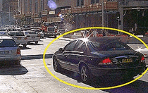 The traffic on the other side of this intersection has stopped. You are in the car shown and want to cross the intersection. The lights are green. What should you do?
