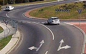 When you wish to drive straight ahead at a roundabout you may enter from either the left or right lane. As you continue around you should -