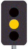 As you approach an intersection with traffic lights, the yellow light turns to red. You must -
