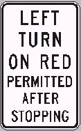 你驶近一个交叉路口，有一个红灯和一个图中的标志牌。你想左转弯。你必须 -
