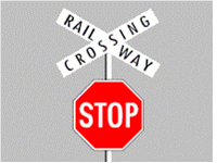 What should you do on approaching a railway level crossing displaying a STOP sign?