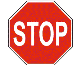 You drive up to an intersection with a stop sign.  There is no painted stop line.  Where should you stop?