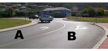 You want to turn left at this roundabout.  Which lane must you use?