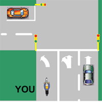 From the diagram, you are riding in a lane with a left turn arrow only and have reached the area where the line markings are continuous. Can you change lanes or drive straight ahead?