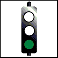 If you are turning right at traffic lights and the light is green (as shown in the diagram), what should you do?